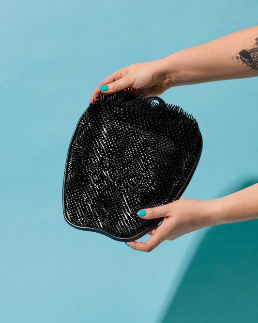 The Footsie non slip shower foot scrubber close up detail